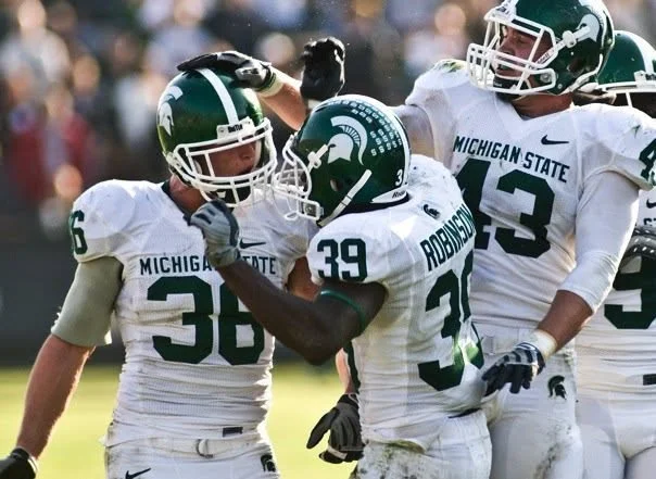 Jon Misch on the field for Michigan State football